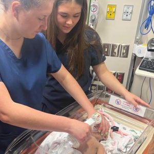 CTEC Medical Students Students at Canyons Technical Education Center practice medical techniques on a baby mannequin