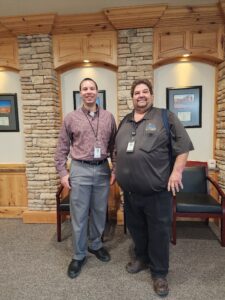 Supporting Safe and Well-Maintained Schools Andrew Edtl stands with a Canyons District facilities employee who helps maintain safe and well-kept school buildings.